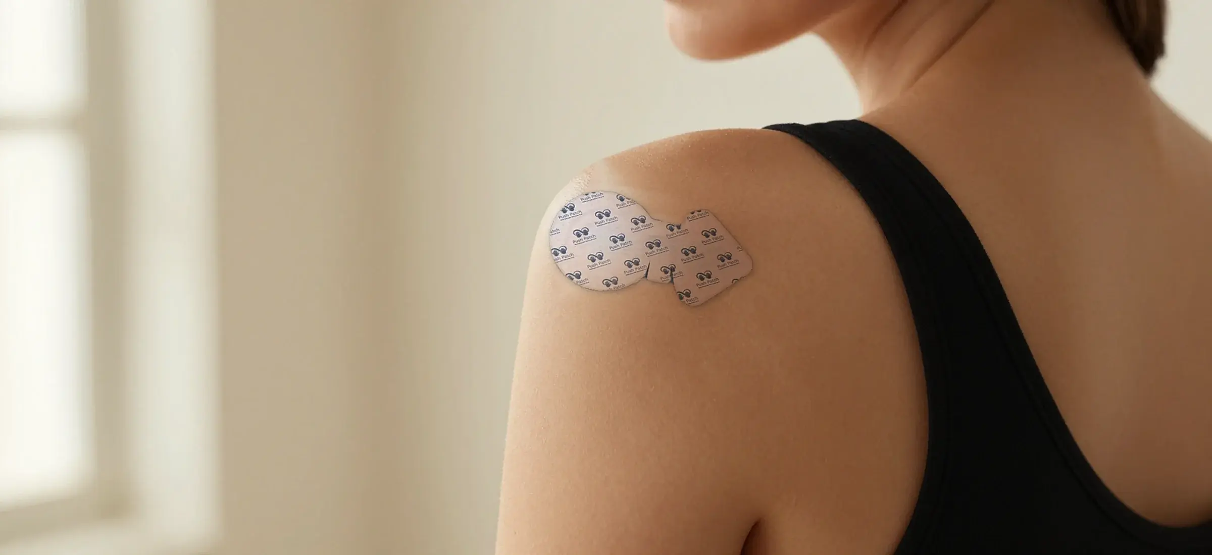 A Push Patch worn on a shoulder